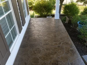 Stamped concrete front porch floor with natural stone pattern in Indianapolis